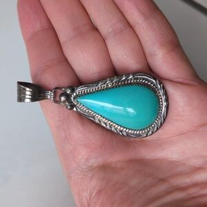 Sterling silver and polished turquoise pendant